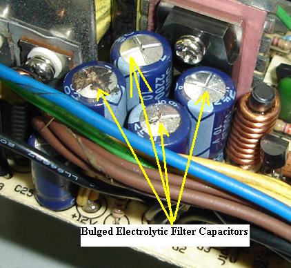 Close-up of a failed VFD DC bus capacitor bulging at the top