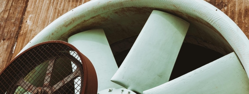 “Close-up of a large industrial cooling fan—proper airflow prevents VFD overheating”
