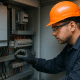 Technician inspecting VFD control wiring